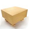 Un majestuoso tablero de shogi ecológico con patas y piezas de shogi de madera especialmente seleccionadas con un juego resistente y audaz. Un tablero de 5 pulgadas