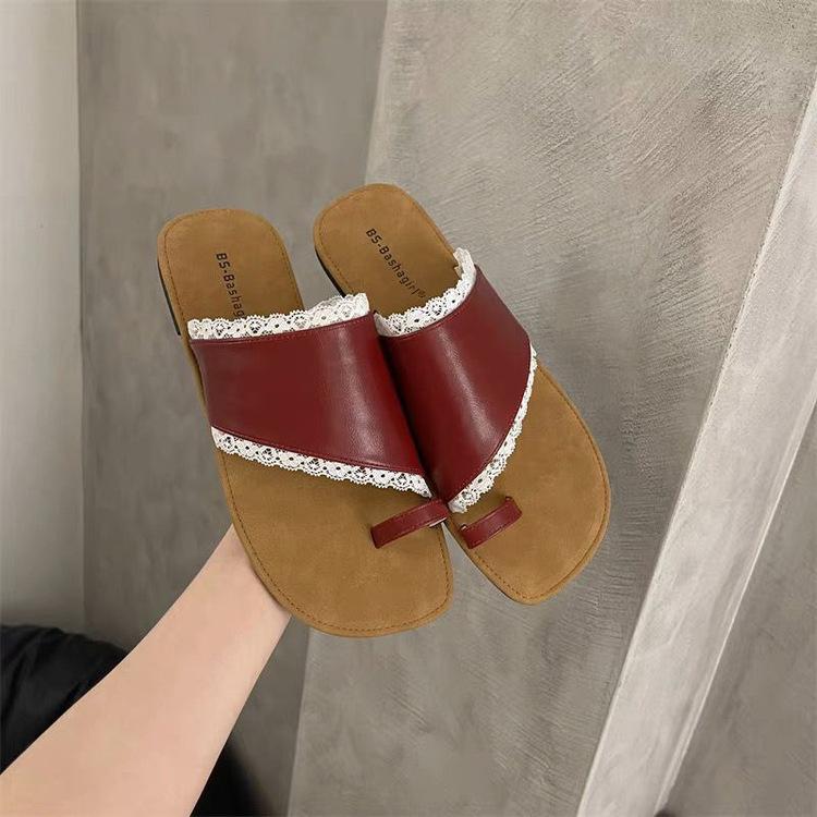 French niche retro one-word toe slippers women's outer wear 2025 summer new flat-bottomed Roman cool slippers