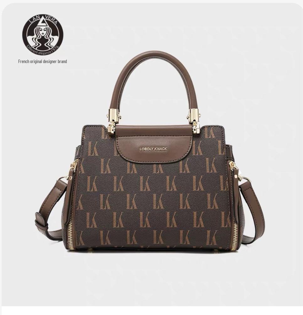 Большая круглая сумка-кроссбоди Boston из натуральной кожи