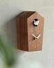 Soothing cuckoo chirps that arrive with the A wooden cuckoo clock that can be placed on a table or mounted on a "Cuckoo Clock" - time. (walnut) wall.