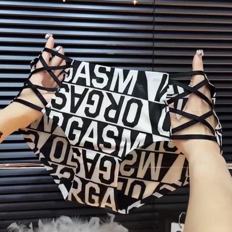 New Sexy Leopard Print Seamless Cutout Panties - Women's Breathable Ice Silk with Cotton Crotch and Thin Temptation Straps.