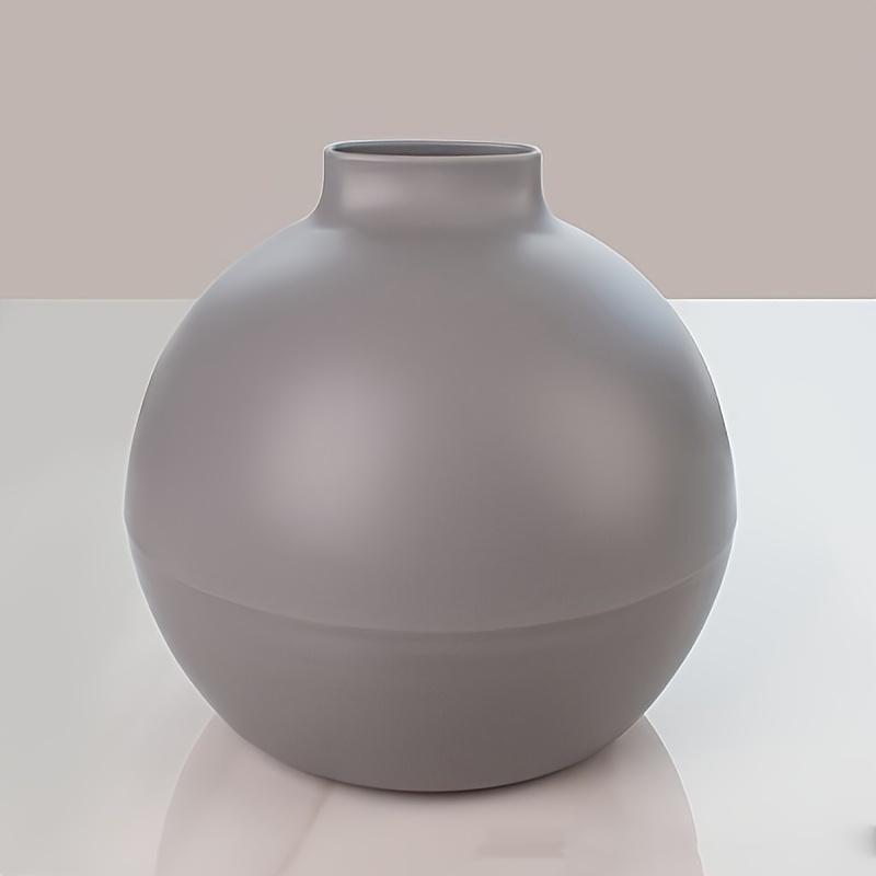 A Round Plastic Tissue Box Tissue DispenserSuitable for KitchensLiving Room and OfficesFeaturing A Nordic Style Tissue Holder