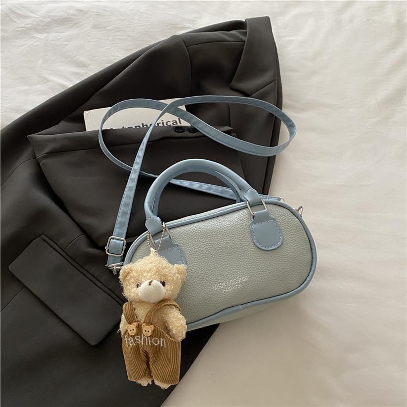 Hot Sale Trend Simple Fashion Niche Litchi Pattern Portable Bowling Bag Commuter Casual Versatile Messenger Bag