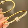 Acciaio Inossidabile Placcato Oro Lusso Fatto a Mano Cristallo Accessorio Donne Avvolgente Bracciale Rigido Zircone Non Appannato