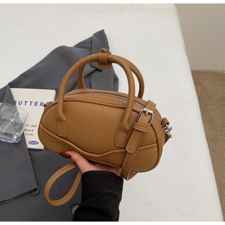 New textured portable bowling bag women's 2025 spring fashion simple shoulder messenger bag popular small square bag