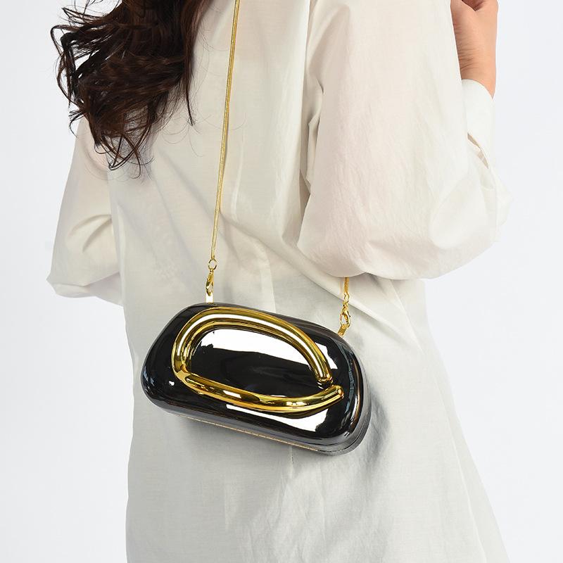 Handbag damska z handlu zagranicznego 2025 nowa europejska i amerykańska moda metalowa torebka na nadgarstek spersonalizowana błyszcząca łańcuszkowa listonoszka torebka wieczorowa