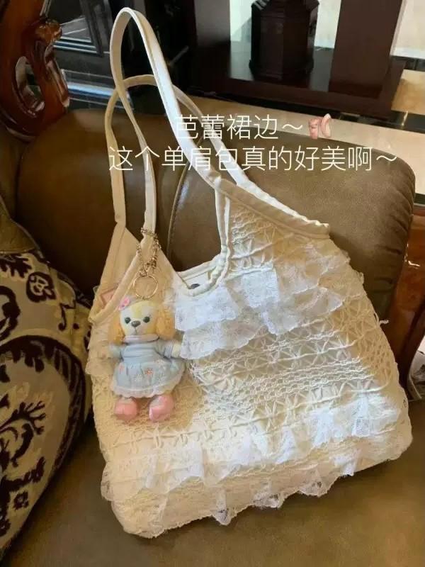 

Повседневная отпускная кружевная сетчатая сумка под мышкой женская 2025 новая универсальная на одно плечо большая вместимость полая сумка-тоут белый