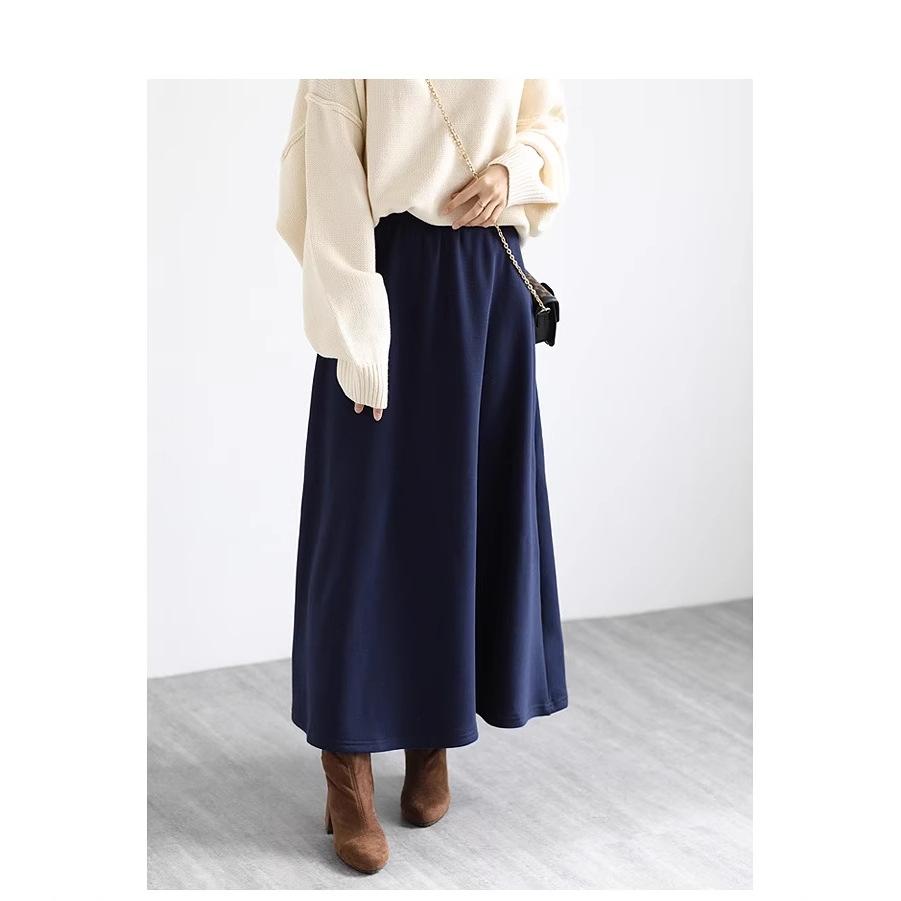 

Женская зимняя флисовая юбка-миди А-силуэта с завышенной талией и расклешенным подолом XL темно-синий