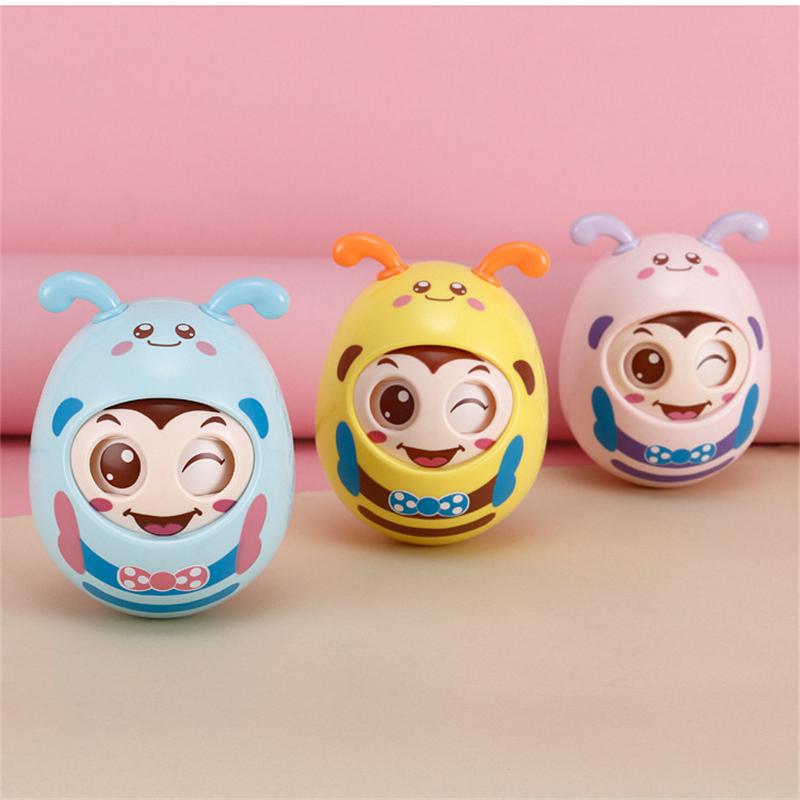 Mobile Doll Bell Baby Toy Rattles Blink Eyes Tumbler Roly-poly Silicon Teether 
