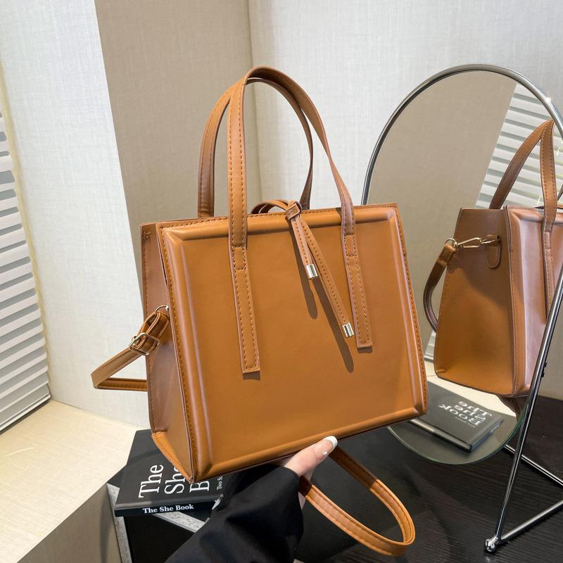 

Spring new niche design handbag pu material shoulder bag trend personalized simple women s bag messenger bag коричневый