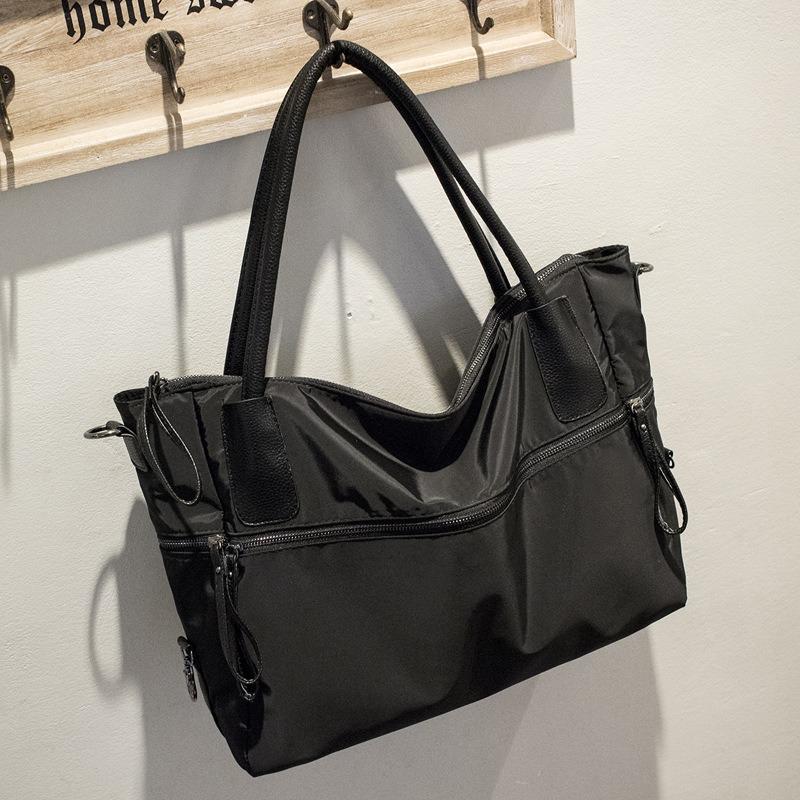 Unisex large-capacity solid color handbag, simple Oxford cloth soft-sided tote bag, new shoulder bag bag.