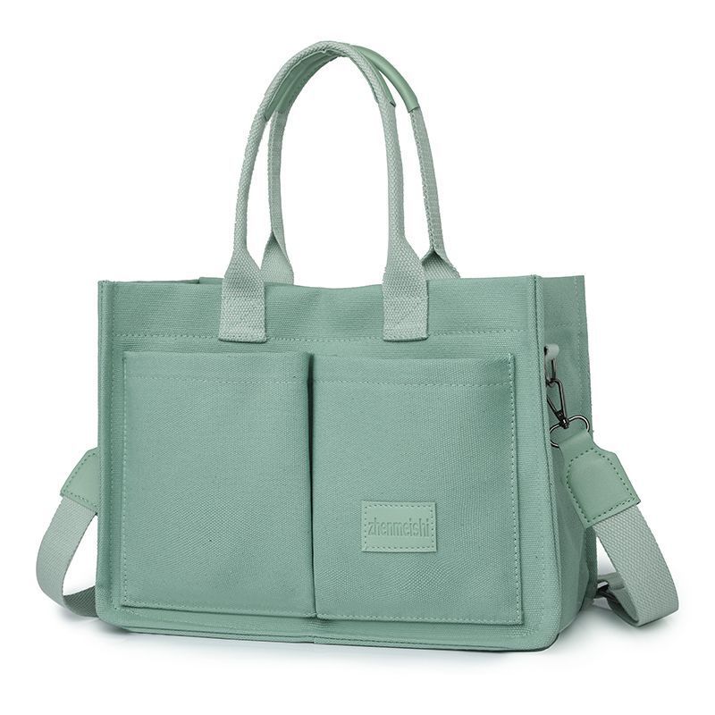 Canvas bag women's large-capacity multi-pocket shoulder bag lady hand-held tote bag