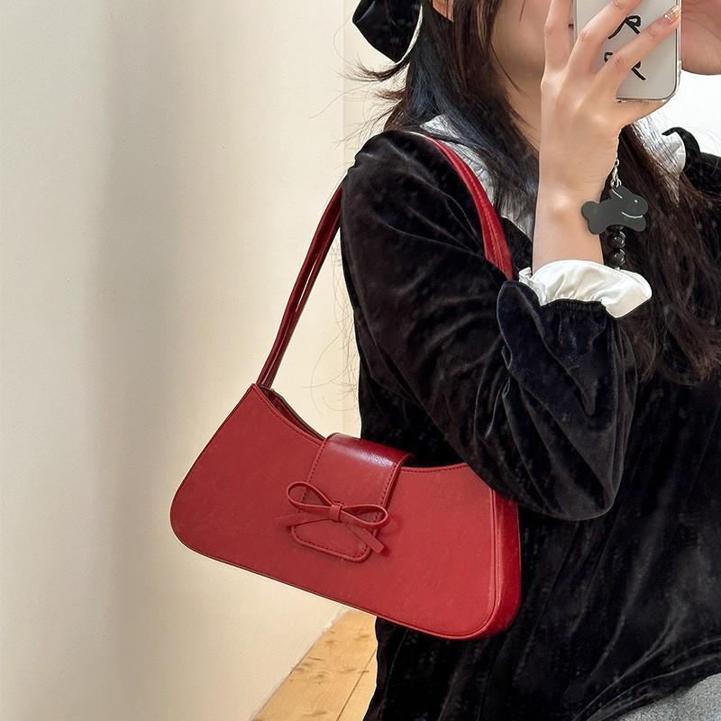2025 New Korean Style Girl Bow Tie French Stick Armpit Bag Niche Design Commuting Simple All-match One-shoulder Portable