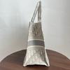 [Pre-Owned] Book Tote Medium White Canvas Monogram Shoulder Bag - Very Good #1VXK2B