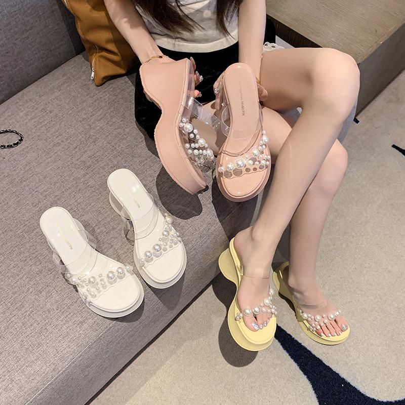 2025 summer new one-word strap transparent sexy high-heeled slippers women's waterproof table pearl slope heel cool slippers