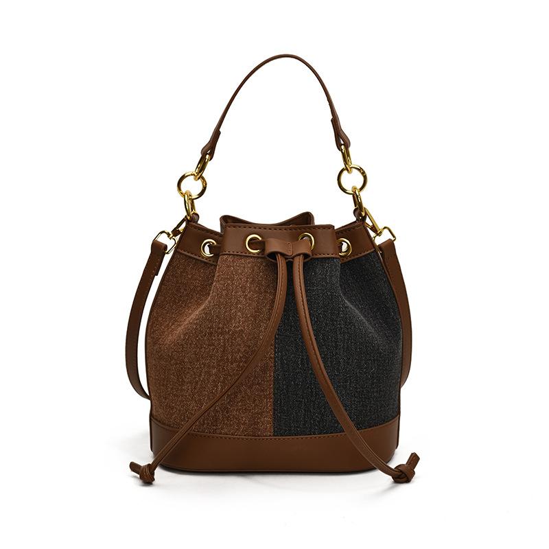 New bag women's 2025 popular bucket bag autumn and winter niche design messenger bag high-end sense work small bag