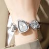 Nouvelle montre de mode de grande valeur pour femmes, cristal de montre irrégulier incrusté de diamants, luxe léger, niche, montre à quartz de grande valeur pour femmes