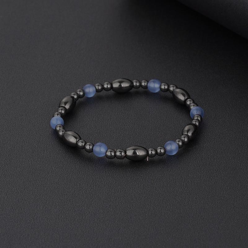 

2023 Европейско-американский черный желчный камень из натурального камня, магнитный браслет для пары с синими бусинами-глазками из смолы.