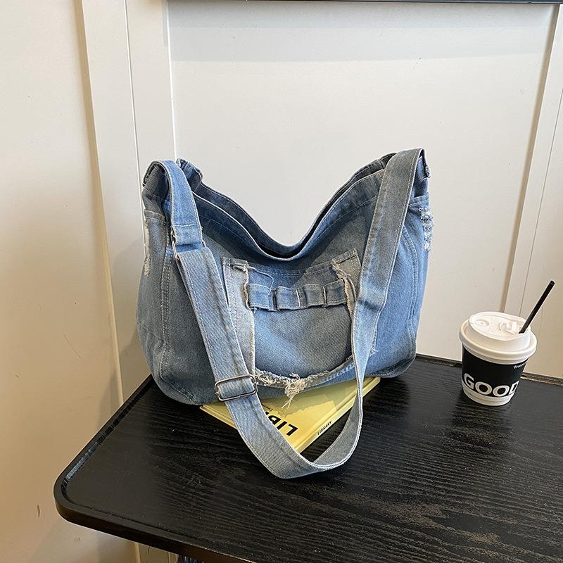 

Denim washed polished tassel messenger bag large capacity flip zipper crossbody student bag leisure bag shoulder women s bag світло-синій колір