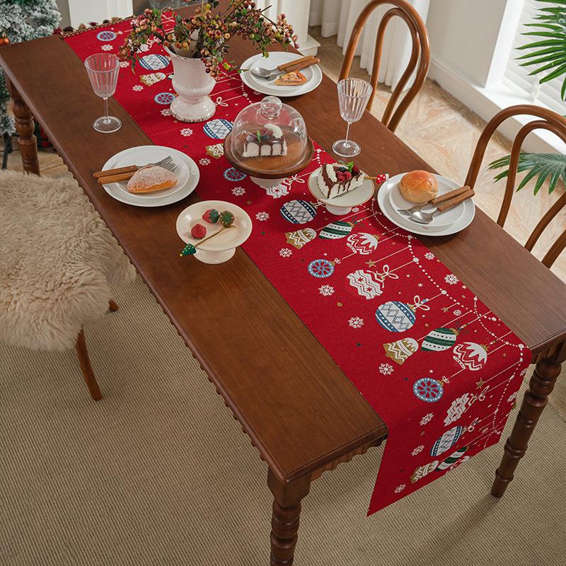 

Праздничная жаккардовая дорожка на стол с рисунком лося и снеговика 35x40 cm