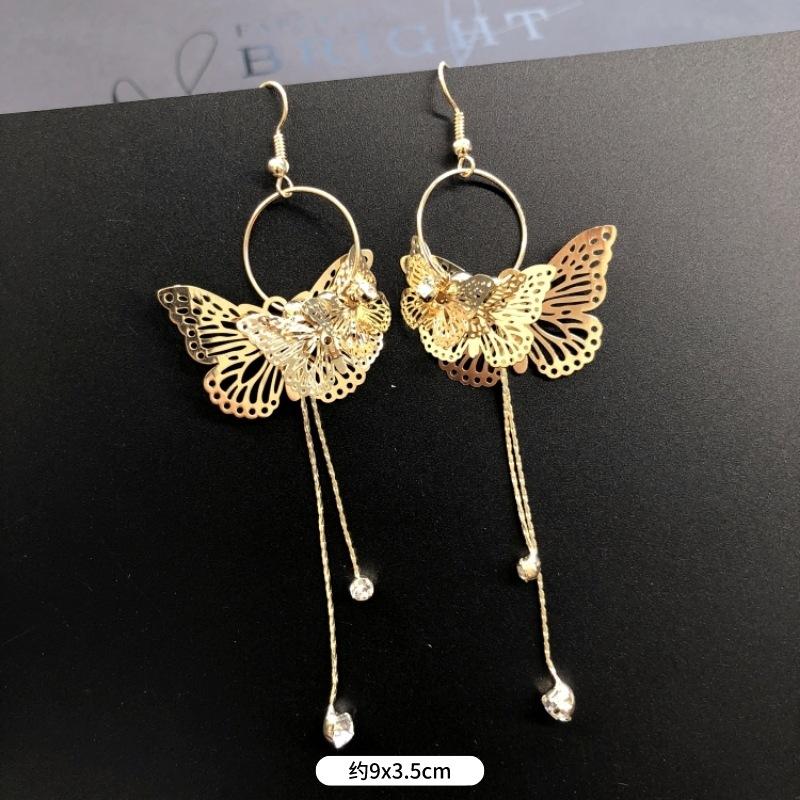 Fashion exaggerated niche temperament fringed earrings retro personality versatile sequined earrings women's long ear jewelry