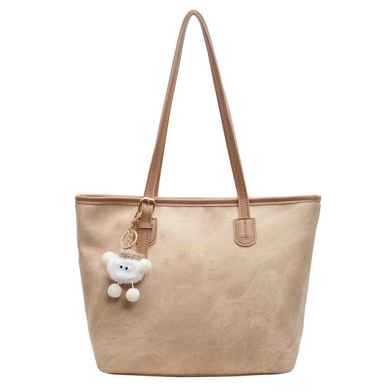 Niche high-end design tote bag large-capacity commuting leisure texture shoulder messenger bag pendant bag