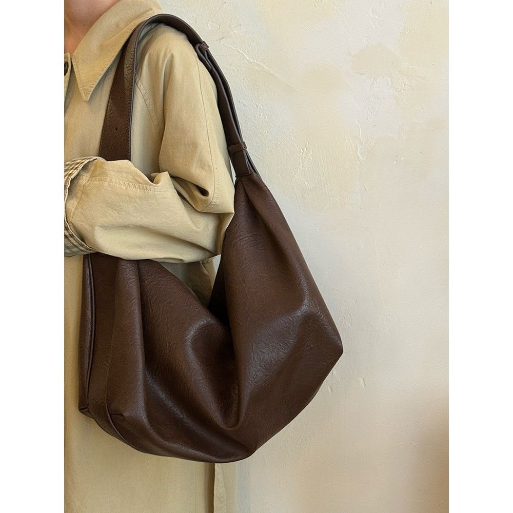 Вместительная ретро сумка-пельмень из мягкой кожи женская 2025 новая высококачественная повседневная сумка тоут через плечо