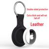 Apple AirTag silicone case with genuine leather texture for high-end fashion and premium protection.