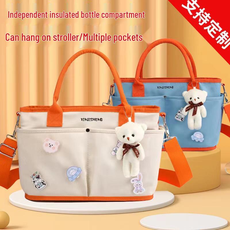 

Multifunctional Mommy & Baby Canvas Bag: Insulated Bottle Holder & Stroller Hanging
