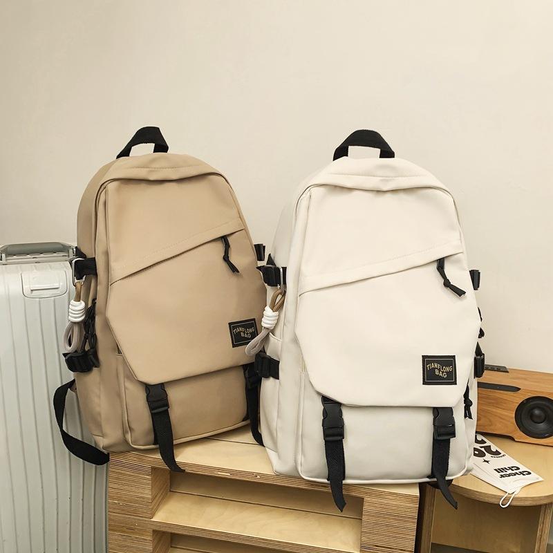 Schoolbag wholesale backpack trend simple outdoor couple backpack male large capacity junior high school high school college student schoolbag