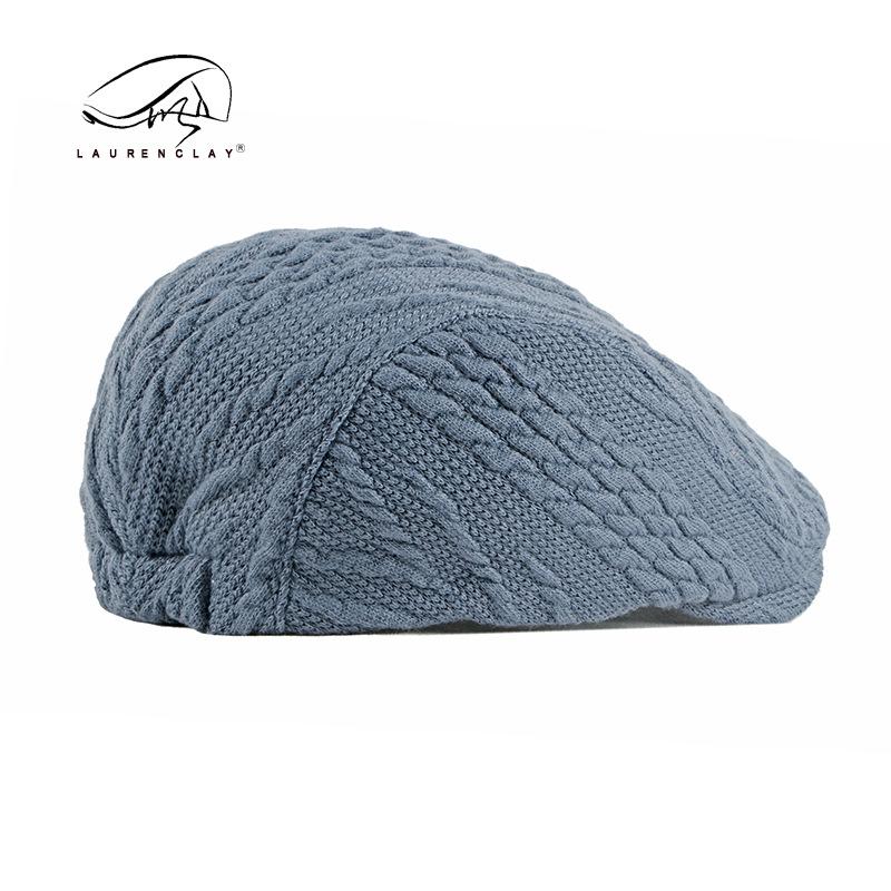 Autumn and winter new knitted wool hat women's British retro beret men's simple light board casual duck tongue forward hat tide