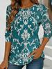 Top da donna blu-verde con stampa floreale, maniche lunghe, vestibilità ampia, girocollo, stile casual di tutti i giorni per la strada con design elegante.