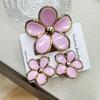 Set di pinze per capelli a forma di frangipani: Accessori per Capelli Floreali in Finto Marmo per Vacanze alla Moda