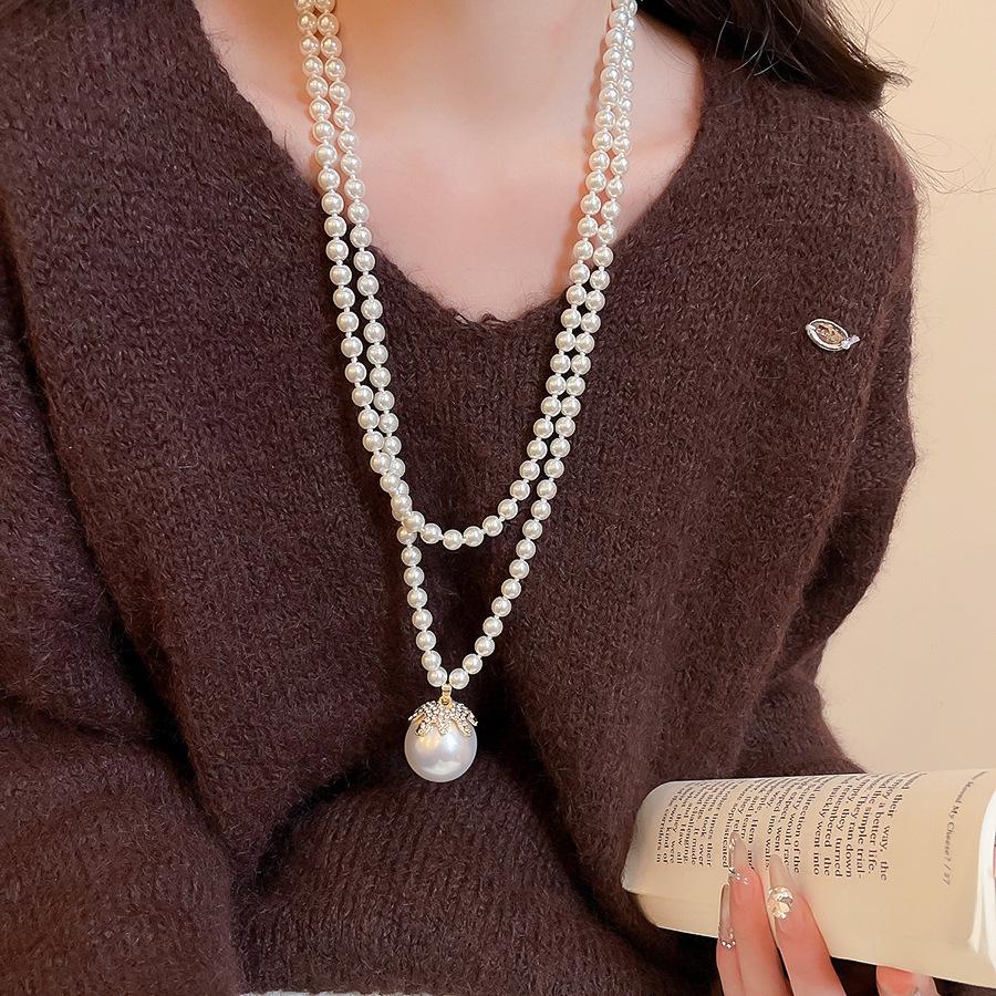 Elegant Minimalist Long Pearl Necklace - French Light Luxury High-End Women's Sweater Chain