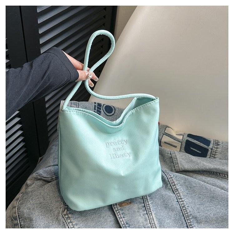 

Elegant Stylish Nylon Shoulder Bag For Women Versatile Tote In Assorted Modern Colors чирковий