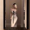 French Beautiful White One-word Shoulder Dress Women's Early Spring Pure Desire Temperament Slim Waist Hip Long Skirt