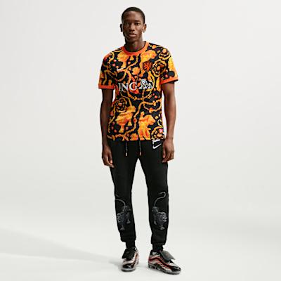Nike Holandia x Patta Academy Pro Koszulka z krótkim rękawem 'Pomarańczowa'