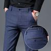 Pantaloni casual noi de toamnă cu picior mic, la modă masculină, versiunea coreeană a valului de pantaloni, pantaloni casual în carouri, pantaloni subțiri pentru tineret