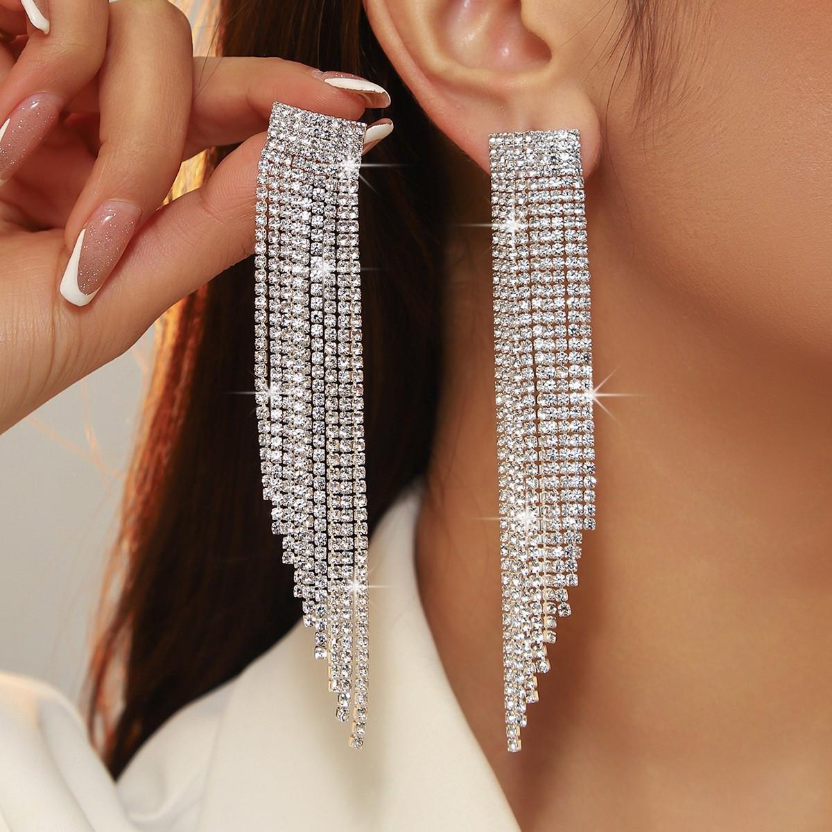 

Скошенные 9-рядные длинные серьги с бахромой