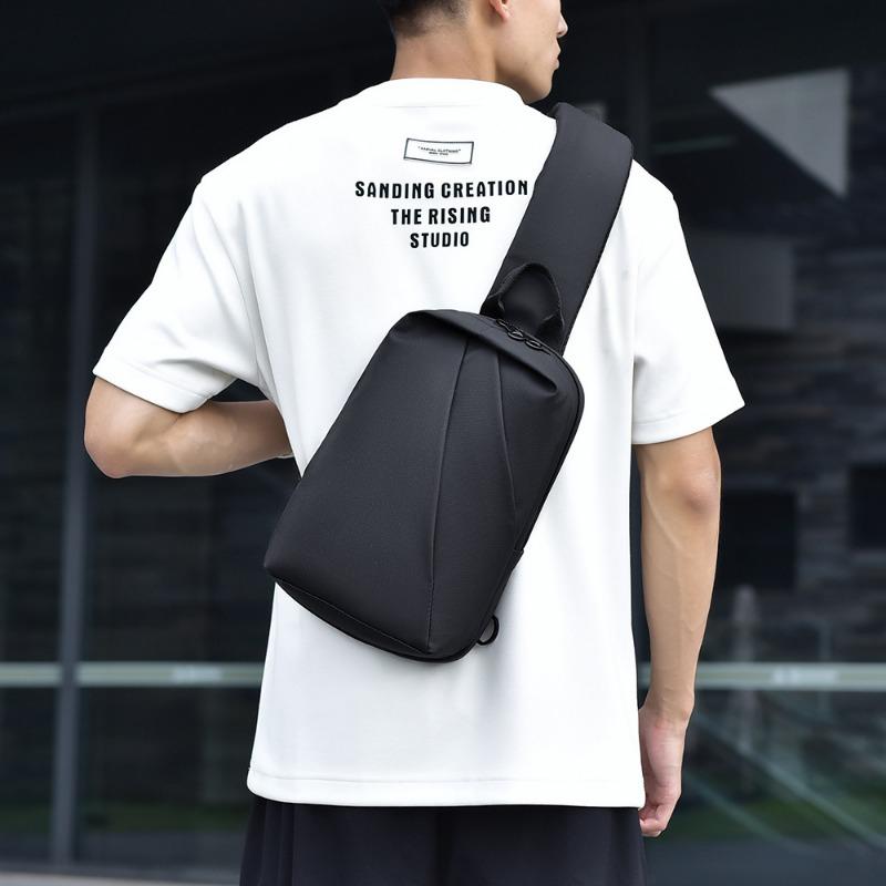Large-capacity wear-resistant waterproof breast bag, new men's business parcel, multi-functional messenger bag.