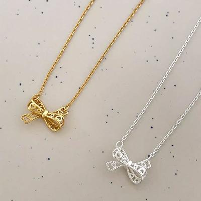 Elegant and Minimalist, Hollowed Out Bow Necklace for Women's Insets, High-end and Luxurious Collarbone Chain