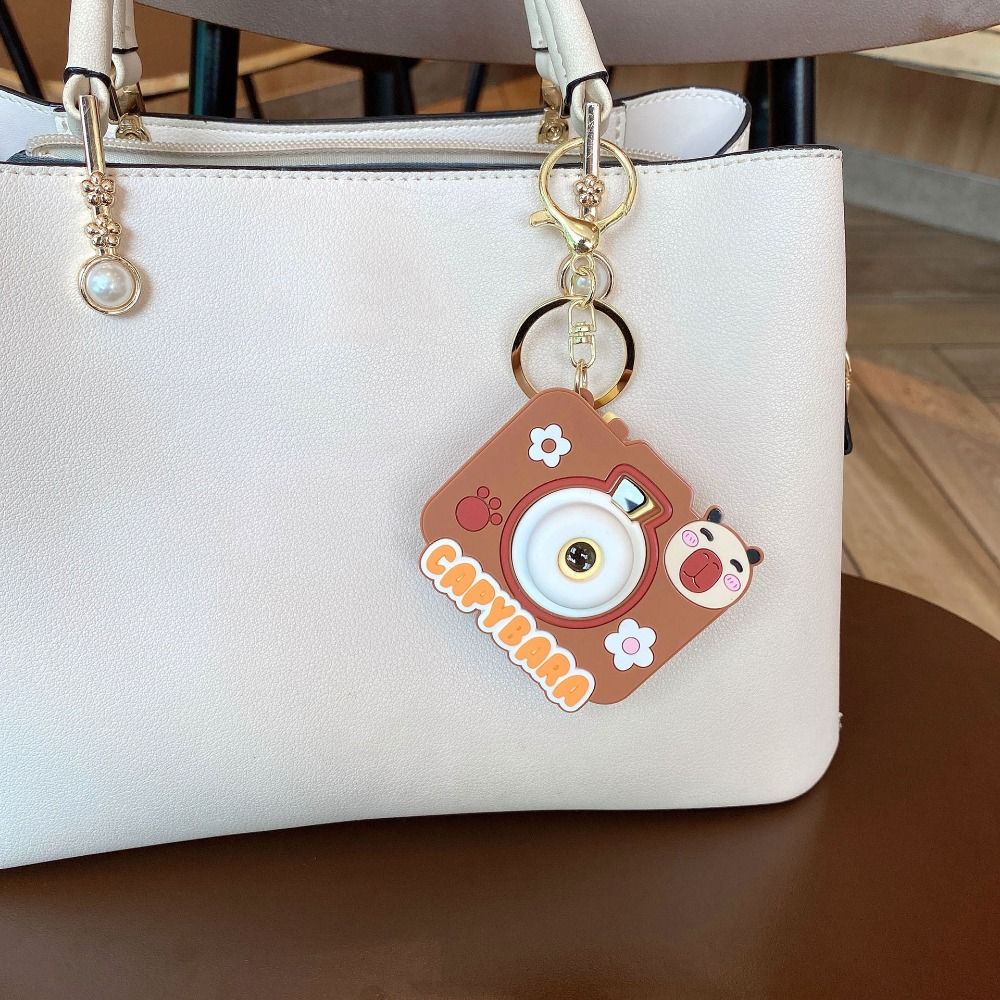 2Pcs Simulation Luminous Cartoon Key Ring Projection Bag Pendant  Children's Toys