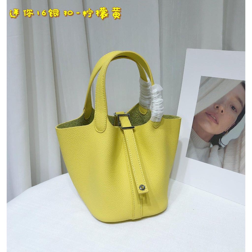 Spot wholesale top layer cowhide vegetable basket bag leather bucket bag commuter fashion lock buckle hand-held handbag woman