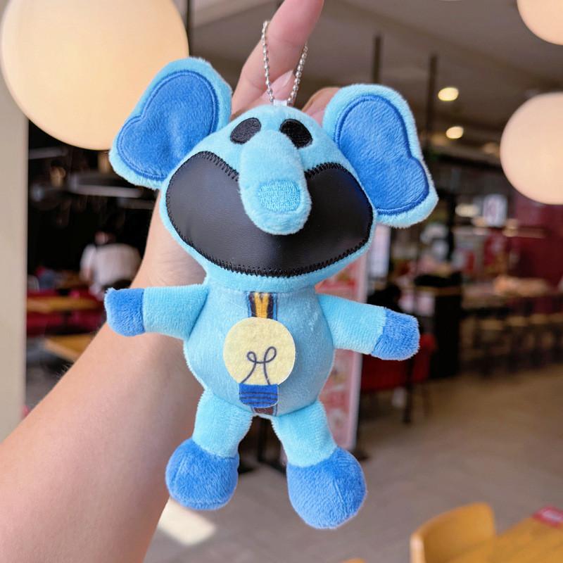 Nyckelring med leende småkryp och plyschdjurshänge, för samlare och presentgivare