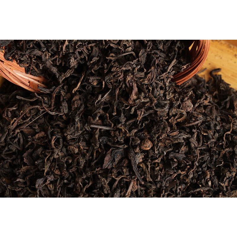 Yunnan Puer Tee Zhang Xiang Uralter Baum Puerh Lose reife Korbpackung 300g