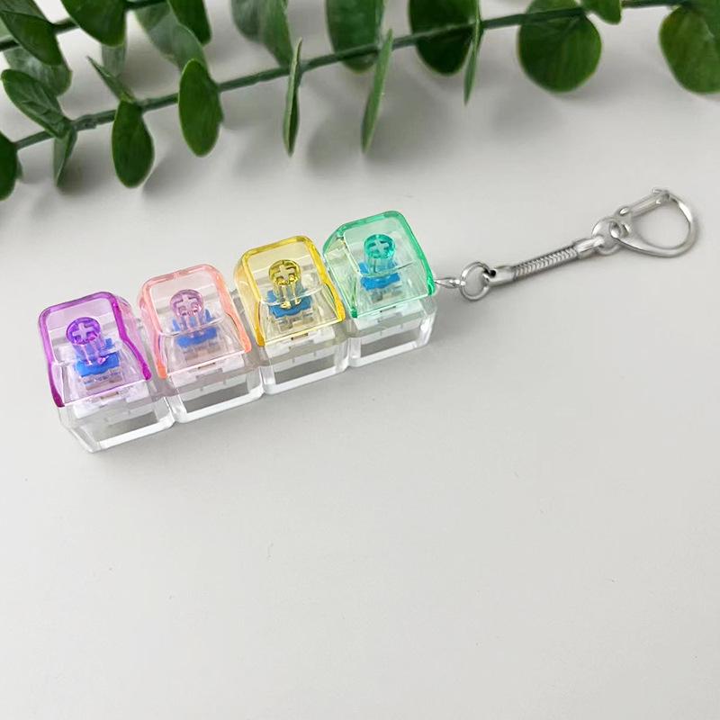 Transparent 4-Key Decompression Keychain with Light and Sound Effects