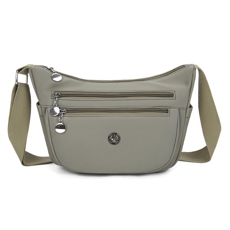 Stylish Nylon Crossbody Bag With Sewn Details And Inner Pocket For Casual Outings