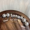 High-end highlight pearl stud earrings women's niche design earrings light luxury ear buckles new earrings explosion