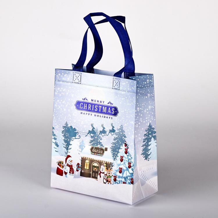 

В наличии Большая мультяшная рождественская нетканая сумка-тоут 2024 - Праздничная подарочная сумка большой вместимости для покупок в канун Рождества Height 25 × Width 20 × Side 15