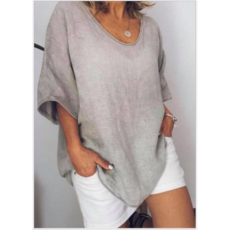 

Вільна футболка з короткими рукавами у стилі casual, яка добре пасуватиме жінкам навесні та влітку L світло-сірого кольору